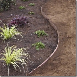 how to install landscape edging on a slant